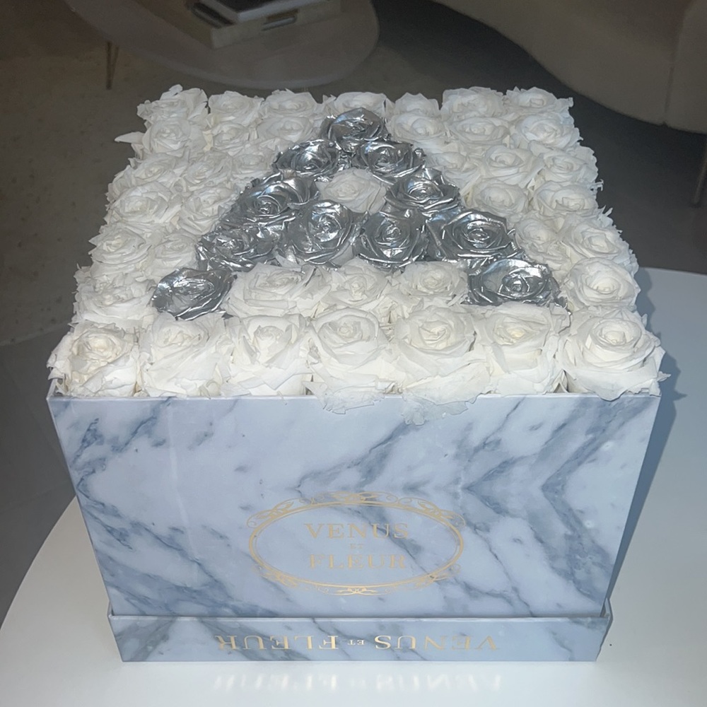 Venus et fleur roses
